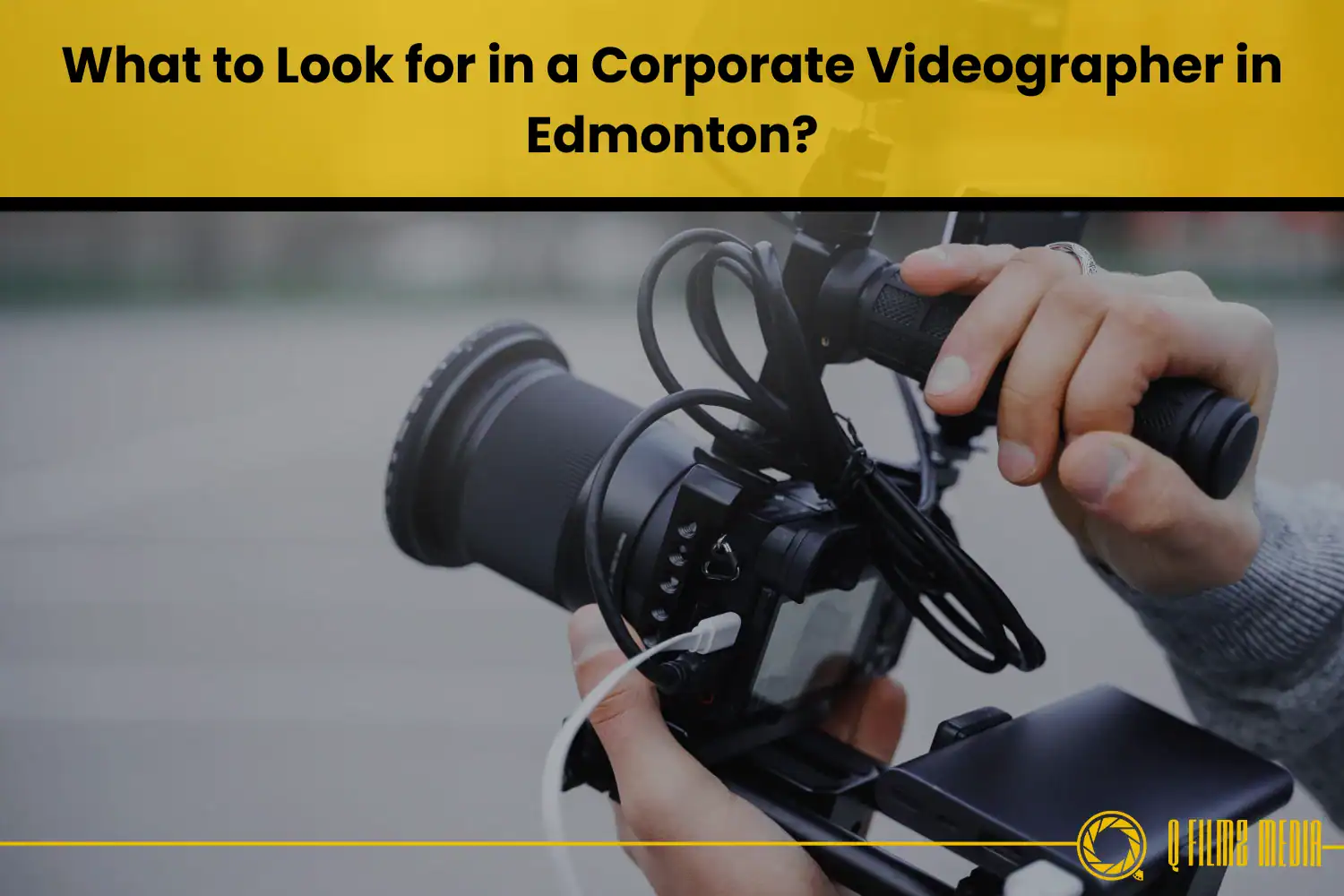 Corporate videographer filming with professional camera in Edmonton, Alberta for business videos and corporate media production, Q Filmz Media.